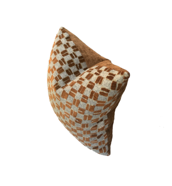 Artisan woven textile cushion in geometric CHESS pattern. Top view showing the back side of cushion.