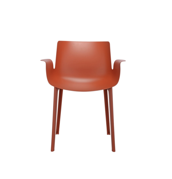 Piuma Chair By Kartell in rusty orange color.